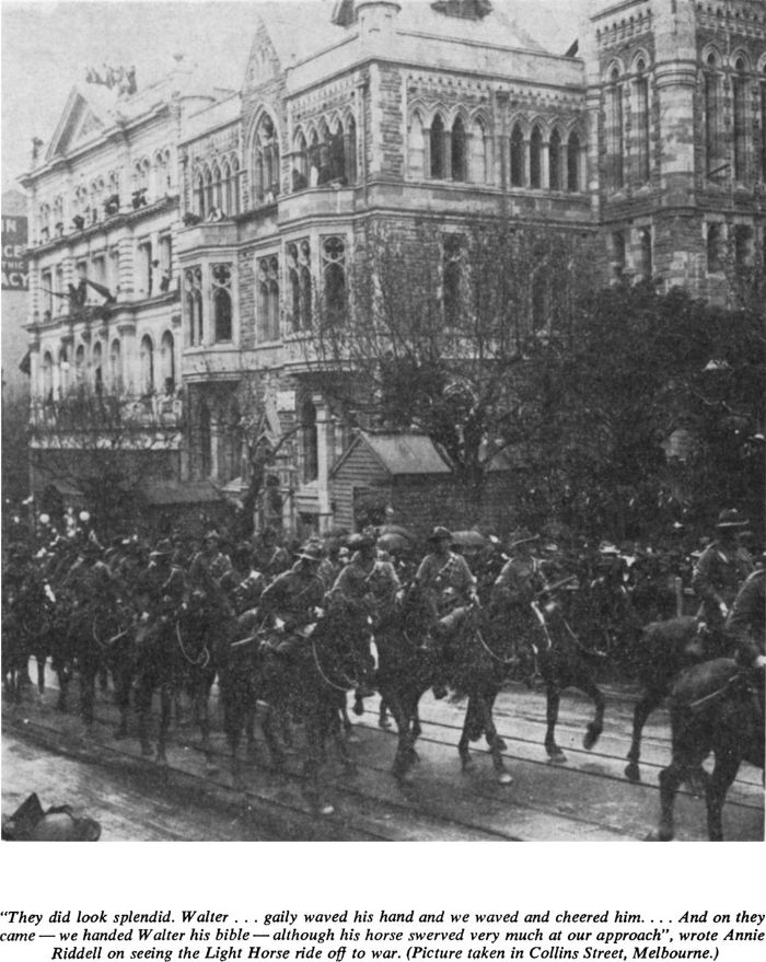 “They did look splendid. Walter…gaily waved his hand and we waved and cheered him… And on they came – we handed Walter his bible – although his horse swerved very much at our approach”, wrote Annie Riddell on seeing the Light Horse ride off to war. (Picture taken in Collins Street, Melbourne.) [photograph]