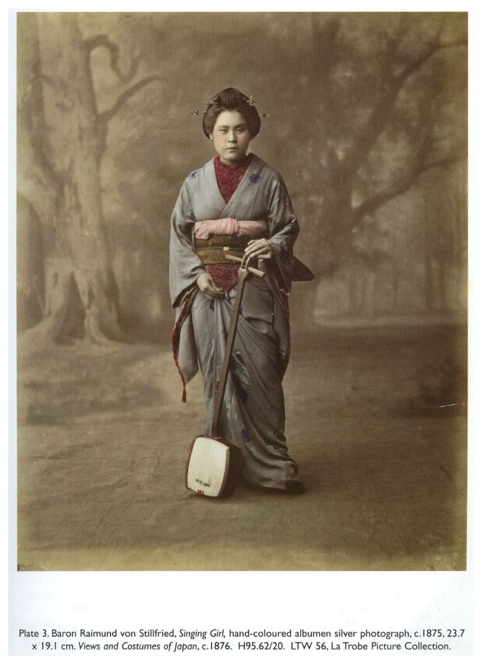 Plate 3. Baron Raimund von Stillfried, Singing Girl, hand-coloured albumen silver photograph, c. 1875, 23.7 × 19.1 cm. Views and Costumes of Japan, c. 1876. H95.62/20. LTW 56, La Trobe Picture Collection.