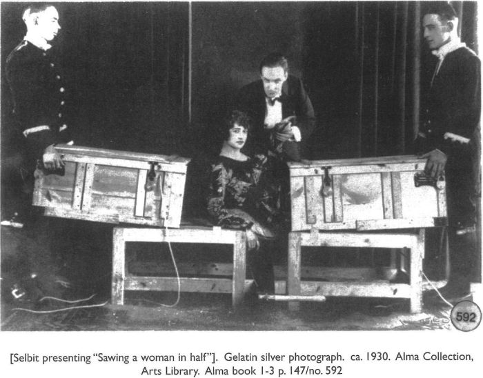 [Selbit presenting “Sawing a woman in half”]. Gelatin silver photograph. ca. 1930. Alma Collection, Arts Library. Alma book 1-3 p. 147/no.592