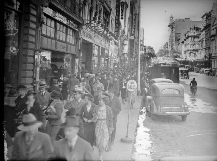 Collins Street looking towards Swanston Street from the Block Arcade, c.1934-1938, with ‘The Australia’ visible in the top left of the photograph. Pictures Collection, H99. 100/4. [Photograph]
